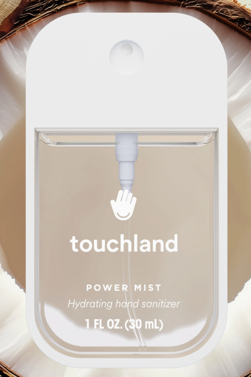 Touchland power mist hydrating hand sanitizer packaging on a natural background